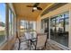 Bright sunroom with table and chairs, perfect for relaxing and enjoying the view at 2542 Bobby Lee Ln, St Cloud, FL 34772