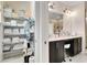 Elegant bathroom with double vanity, linen closet and shower at 2935 Rapollo Ln, Apopka, FL 32712