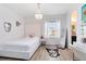 Bright bedroom with a queen-size bed and plenty of natural light at 2935 Rapollo Ln, Apopka, FL 32712