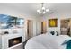 Serene bedroom with fireplace and built-in shelving at 2935 Rapollo Ln, Apopka, FL 32712