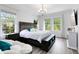 Main bedroom with dark wood furniture, and plenty of natural light at 2935 Rapollo Ln, Apopka, FL 32712