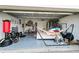 Bright garage with room for bikes, storage, and a hammock at 2935 Rapollo Ln, Apopka, FL 32712