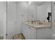 Bathroom with double sinks and modern fixtures at 3065 Caribbean Soul Dr, Kissimmee, FL 34747