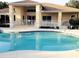 Resort-style community pool with clubhouse view at 3133 Sun Lake Ct # B, Kissimmee, FL 34747