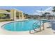 Inviting community pool with surrounding lounge area at 3133 Sun Lake Ct # B, Kissimmee, FL 34747