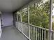 Private screened balcony overlooking lush trees at 3133 Sun Lake Ct # B, Kissimmee, FL 34747