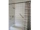 Bathroom with a bathtub, shower, and grab bar at 342 E Tillman Ave, Lake Wales, FL 33853