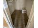 Walk-in closet with storage space, vinyl flooring and a small window AC unit at 342 E Tillman Ave, Lake Wales, FL 33853