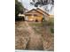 Backyard with a shed, and wooden walkway at 342 E Tillman Ave, Lake Wales, FL 33853