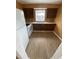 Galley kitchen with appliances and generous counter space, ready for new owners to enjoy at 342 E Tillman Ave, Lake Wales, FL 33853