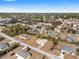 Aerial view of a neighborhood with a single Gathering home and other houses surrounding the property at 4181 Sw 111Th Pl, Ocala, FL 34476