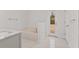 Bathroom featuring a soaking tub, marble countertop vanity, and access door to the outside at 4181 Sw 111Th Pl, Ocala, FL 34476