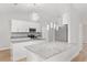 Modern kitchen with granite countertops, stainless steel appliances, and pendant lighting at 4181 Sw 111Th Pl, Ocala, FL 34476