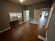 Comfortable bedroom featuring modern flooring, neutral paint, and two closets at 433 Pennsylvania Ave, St Cloud, FL 34769