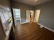 Comfortable bedroom featuring modern flooring, neutral paint, and a walk-in closet at 433 Pennsylvania Ave, St Cloud, FL 34769