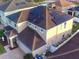 House with solar panels on the roof and a large backyard at 4702 Greycliff Prairie Dr, Kissimmee, FL 34758