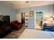 Main bedroom with ensuite bathroom and sitting area at 4702 Greycliff Prairie Dr, Kissimmee, FL 34758