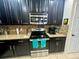 Stainless steel appliances and granite countertops at 4702 Greycliff Prairie Dr, Kissimmee, FL 34758