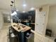 Open concept kitchen with breakfast bar at 4702 Greycliff Prairie Dr, Kissimmee, FL 34758