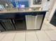 Kitchen island with dishwasher and granite countertops at 4702 Greycliff Prairie Dr, Kissimmee, FL 34758