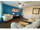Spacious living room with two sofas and wood floors at 4702 Greycliff Prairie Dr, Kissimmee, FL 34758