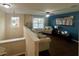 Open living room with comfy seating and wood floors at 4702 Greycliff Prairie Dr, Kissimmee, FL 34758