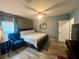 Main bedroom with comfortable seating and large closet at 4702 Greycliff Prairie Dr, Kissimmee, FL 34758