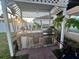 Outdoor kitchen with stainless steel appliances at 4702 Greycliff Prairie Dr, Kissimmee, FL 34758