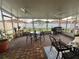 Large screened patio with ceiling fans and grill at 4702 Greycliff Prairie Dr, Kissimmee, FL 34758