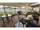 Relaxing screened patio with seating and outdoor kitchen at 4702 Greycliff Prairie Dr, Kissimmee, FL 34758