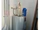 Photo of a water heater and plumbing in a home's utility closet at 4702 Greycliff Prairie Dr, Kissimmee, FL 34758