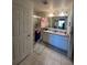 Bathroom with double sinks, granite countertop, and a shower at 503 Summer Grove Ln, Haines City, FL 33844