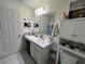 Clean bathroom with double vanity and shower at 503 Summer Grove Ln, Haines City, FL 33844