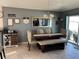 Dining room with a wooden table, beige chairs, and a bench at 503 Summer Grove Ln, Haines City, FL 33844