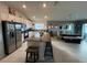 Modern kitchen with island and dining area at 503 Summer Grove Ln, Haines City, FL 33844
