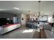 Open kitchen with island and stainless steel appliances at 503 Summer Grove Ln, Haines City, FL 33844