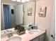 Modern bathroom with double vanity, large mirror, and plenty of counter space at 5465 Misty Oak Cir, Davenport, FL 33837