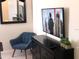 Bedroom with dresser, chair and wall-mounted TV at 5465 Misty Oak Cir, Davenport, FL 33837