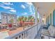 Spacious balcony with seating and views of the town at 600 Market St # 210, Celebration, FL 34747