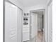 White bathroom with shower and storage at 600 Market St # 210, Celebration, FL 34747