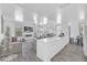 Open concept living area with modern kitchen and fireplace at 600 Market St # 210, Celebration, FL 34747