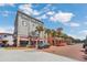 View of the town square with shops and restaurants at 600 Market St # 210, Celebration, FL 34747