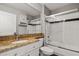 Updated bathroom with granite vanity and a tub shower at 600 Market St # 340, Celebration, FL 34747