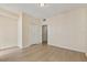 Spacious bedroom featuring hardwood floors and a large closet at 600 Market St # 340, Celebration, FL 34747