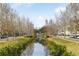 Peaceful canal pathway with walkway and trees at 600 Market St # 340, Celebration, FL 34747