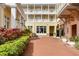 Shared courtyard with brick pavers and building exterior view at 600 Market St # 340, Celebration, FL 34747