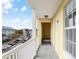 Building hallway with an 'exit' sign and views of the parking area at 600 Market St # 340, Celebration, FL 34747