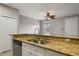Kitchen boasts granite countertops and a double sink at 600 Market St # 340, Celebration, FL 34747
