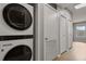 Stackable washer and dryer in a convenient laundry closet at 600 Market St # 340, Celebration, FL 34747