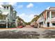 Scenic town square with shops and palm trees at 600 Market St # 340, Celebration, FL 34747